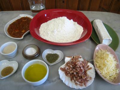 Ingrédients pour la recette : Mini-pizzas à la tomate et au chèvre