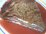 Recette Gâteau de crêpes aux framboises et à la mangue