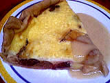 sucre vanillé : Part de tarte aux prunes et pommes