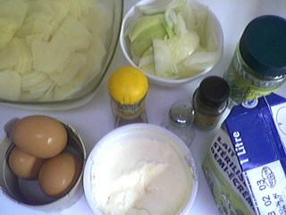 Ingrédients pour la recette : Pommes de terre en gratin façon "Bayenne" 